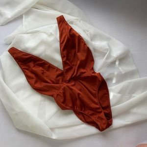 UO Out From Unser Rust Orange Body Suit
